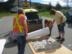 Printing from the woodblock - using a road packer!